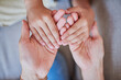 © Sanc/peopleimages.com - Love, above and parent holding hands with child for respect, kindness and support in growth. Home, bonding and person with gesture of care to kid for connection, safety and guidance in development