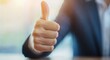 © patungkead - Close up of Businessman s Hand Giving Thumbs Up