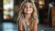 © Wiseman - portrait of cute girl sitting on the floor in the kitchen