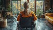 © Wiseman - young disabled woman in wheelchair at home rear view