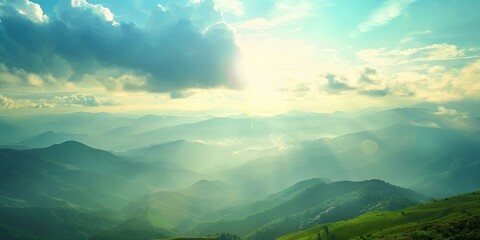 Wall Mural - Aerial View of Misty Green Mountains with Sunbeams