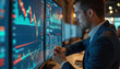© 2April - Businessman Analyzing Stock Market Data on  Computer Monitors