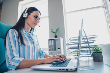 Wall Mural - Photo of smart chief female working computer call center wear striped formalwear comfortable modern office interior indoors workspace