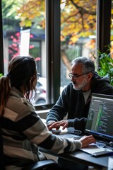 A mentor teaching a young data scientist the principles of machine learning, with datasets, algorithms, and AI models visible on computer screens.