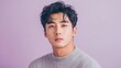 © Maria Vitkovska - Handsome korean man posing on purple background