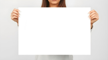 Woman holding white paper canvas mockup. Template for banner or poster.	