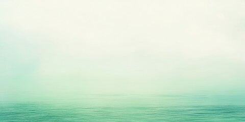 Canvas Print - Calm sea with soft fog in the distance.