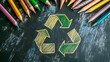 © Kraiwit - Hand-Drawn Recycling Symbol with Crayons on Blackboard