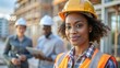 © N7 - Female Construction Supervisor - An African American woman overseeing a construction project.