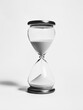 © Martin - Hourglass with white Sand Running Out