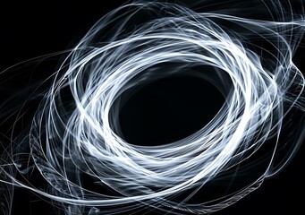 Wall Mural - Abstract Light Trails Swirling in a Circle On Black Background