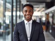 © Human AI - Portrait Attractive African young confident business man in business professional working office.