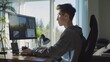 © VK Studio - A focused individual working on a computer in a bright, modern home office setting reflects productivity and concentration.