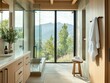 © Bouchra - A bathroom with a large window overlooking a mountain. A white towel is hanging on a rack. A stool is placed in front of the window