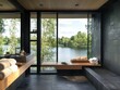 © Bouchra - A bathroom with a window overlooking a lake. There are two sinks, a bench, and a towel rack