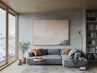 A living room with a large framed painting on the wall. The couch is gray and has two pillows on it. There are two potted plants in the room, one on the left and one on the right