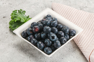 Wall Mural - Sweet ripe blueberry on the bowl