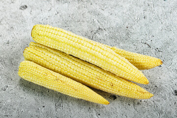 Canvas Print - Raw sweet baby corn heap