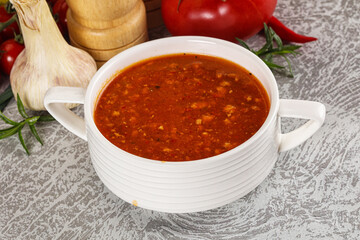 Hot tomato soup with diced chicken