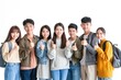 © Rawpixel.com - Group of asian student white background togetherness architecture.