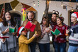 © Marcos - mexican family Singing carols in Christmas eve and celebrating traditional Posadas in Mexico Latin America, hispanic culture and people