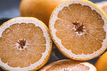 Texture of a ripe grapefruit slice, macro shot