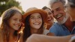 © Terablete - Families enjoying a sunny day together with smiles and laughter in a park setting during late afternoon