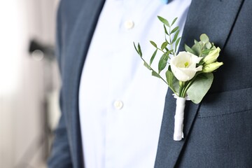 Poster - Groom in suit with stylish boutonniere indoors, closeup