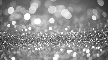 Sparkling silver glitter background with bokeh effect