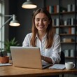 © IRINA - Modern freelancer woman smiling while working on laptop in cozy home office environment