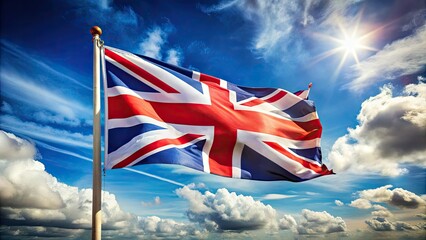 a close-up shot of the union jack waving proudly in the wind, with a blurred blue sky and fluffy whi