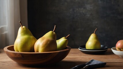 Pears in wooden bowl on dining table background