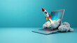 © sema_srinouljan - A laptop with a rocket coming out of the screen