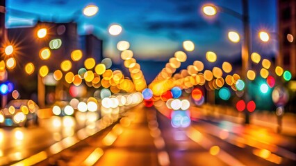 Blurred street lights at night creating abstract bokeh background with warm glow