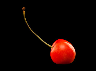 Wall Mural - Cherry berries isolated on black background.