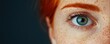 © HideAwayDigitalTH - Close-up of a human eye showcasing vibrant color and freckles, emphasizing natural beauty and emotion against a dark background.