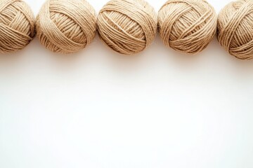 Natural jute twine balls on white background