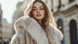 © IllustrateMuse - Woman in luxurious fur coat on sunny day in city street