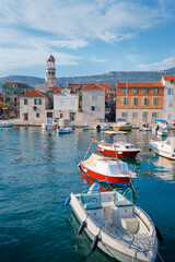 Wall Mural - Kastel coast in Dalmatia,Croatia. A famous tourist destination on the Adriatic sea. Fishing boats moored in old town harbor.