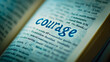 © URRMInc - Word 'Courage' in old book.