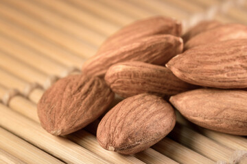 a healthy almond on a wooden background with soft lighting