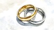 © Keattipoom - Ethereal Union - Watercolor Painting of Interlocking Gold and Silver Wedding Rings Symbolizing Unity and Love