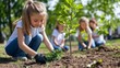 © musa - A group of children are planting trees in a park.