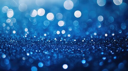Sapphire inspired bokeh background featuring shimmering blue sparkles and crystal like droplets