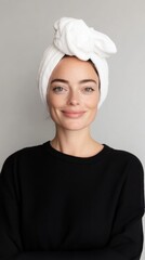 Poster - A woman with a towel on her head