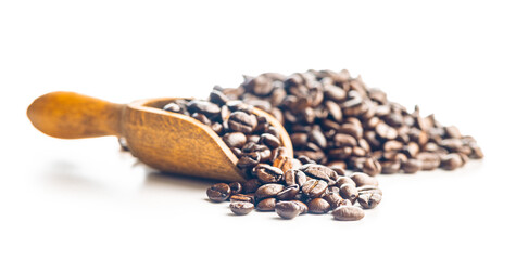 Sticker - Roasted coffee beans in wooden scoop isolated on white background.