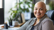 © Dirk - Bald plus size female office worker smiling; office environment; inclusive & diverse friendly workplace. Acceptance of diversity, body inclusive theme. Diversity themes poster concerning baldness, bea