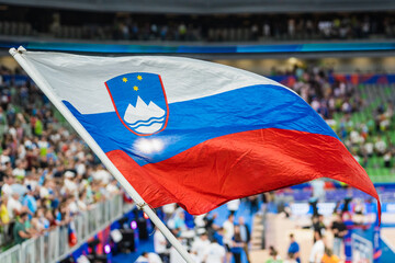 The Slovenian flag during the cheering of the fans at the match