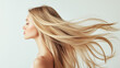 © LastSong - blond girl with long shiny hair on a white background, shampoo advertising