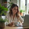 © Edwin - Woman working remotely from home